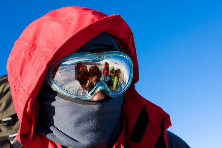 Hiker are in winter in mountainsの写真素材
