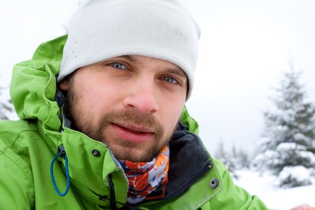 Hiker are in winter in mountainsの写真素材