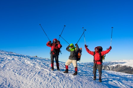 Hiker are in winter in mountainsの写真素材