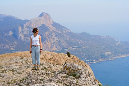 Girl on the top of mountainの写真素材