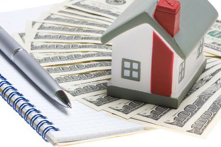 house with dollar bills backgroundの写真素材