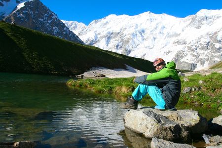 Hiker in Caucasus mountains