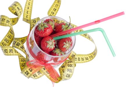 Smoothie made with strawberries and a measure tapeの写真素材