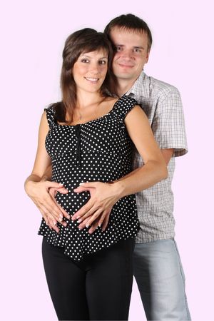 happy pregnant woman with husbandの写真素材
