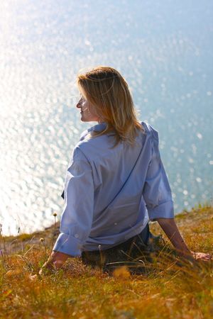 Young woman relaxing on a river
の写真素材