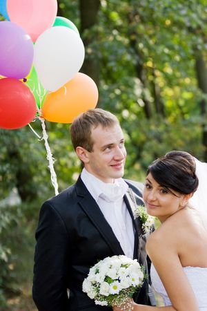 Happy bride and groom on their wedding dayの写真素材