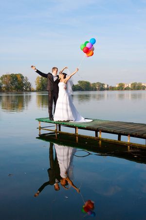 Happy bride and groom on their wedding dayの写真素材
