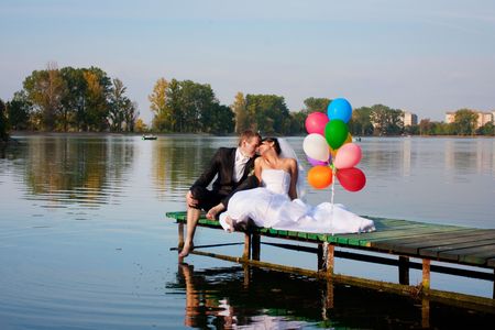 Happy bride and groom on their wedding dayの写真素材
