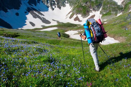 Hiker in Caucasus mountains