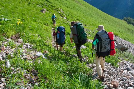Hiker in Caucasus mountains