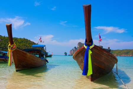 Thai boat in the bay の写真素材