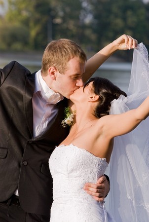 Happy bride and groom on their wedding dayの写真素材