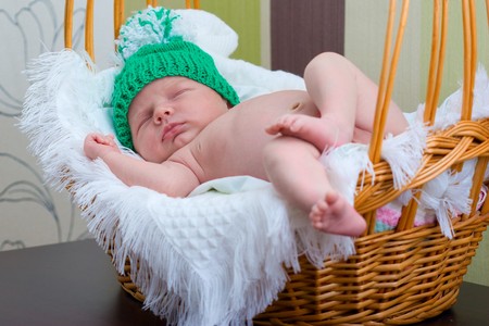 baby sleeps in the basketの写真素材