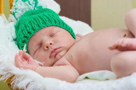 baby sleeps in the basketの写真素材