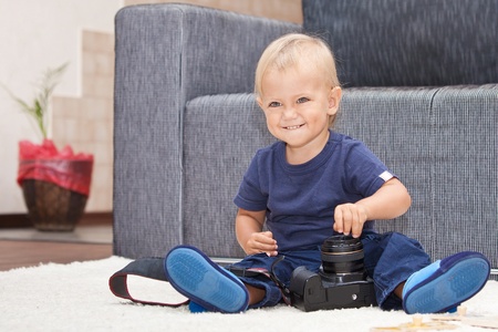 Happy boy plays at homeの写真素材