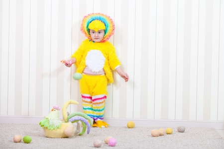 Child in costume of chicken