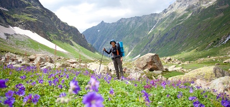 Hiker in Caucasus mountains