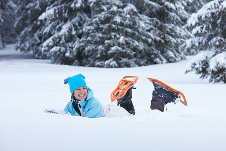 Hiker lying in snow