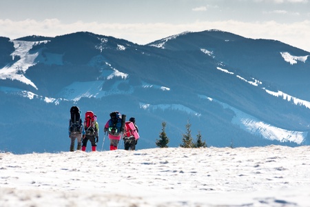 Hiker in winter mountainsの写真素材