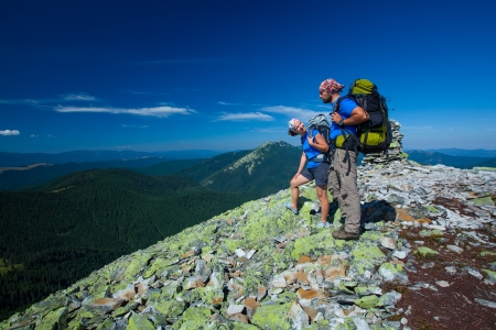 Portrait of couple at the top of the mountainの写真素材
