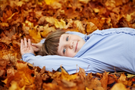 adorable little girl in the beauty parkの写真素材