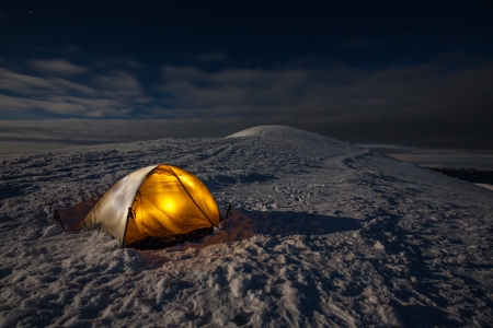 Camping during winter hiking in Carpathian mountainsの写真素材