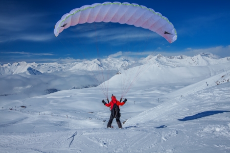 Sky gliding in snowy Caucasus mountains.Georgia, ski resort Gudauri.の写真素材