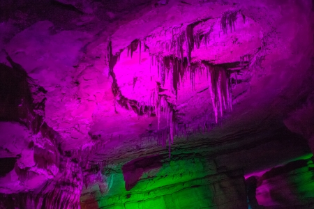 Sataplia cave in Georgia lit by different colorsの写真素材