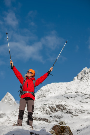 Hiker posing in Himalayas in front of big mountainsの写真素材