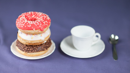 Cup of coffee with donutsの写真素材