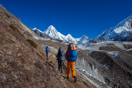 Hiker on the trek in Himalayas, Khumbu valley, Nepalの写真素材