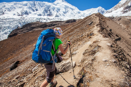 Hiker on the trek in Himalayas, Manaslu region, Nepalの写真素材