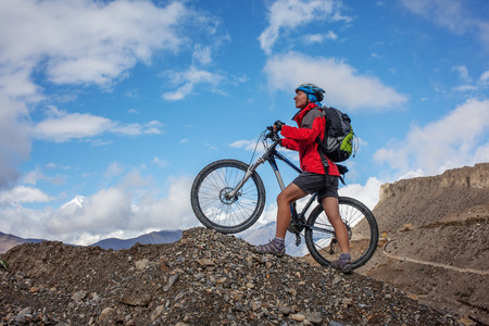 Biker-girl in Himalaya mountains, Anapurna regionの写真素材