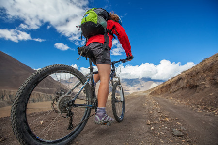 Biker-girl in Himalaya mountains, Anapurna regionの写真素材
