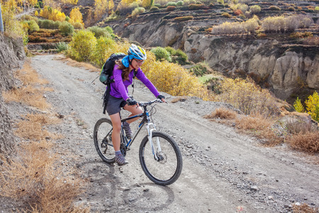 Biker-girl in Himalaya mountains, Anapurna regionの写真素材