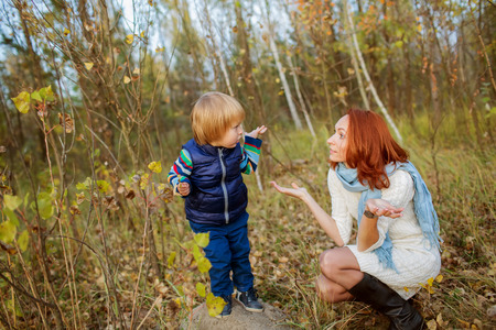 Caucasian baby boy take rest in summer parkの写真素材