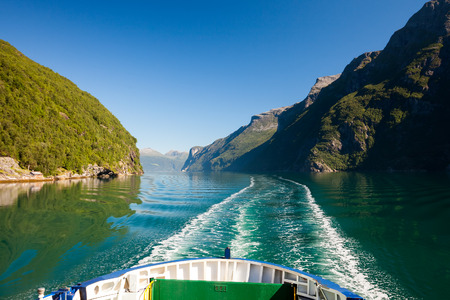 Travelling along Geiranger Fjord in Norwayの写真素材