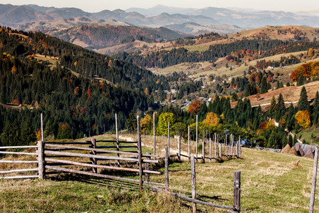 Small village in autumn Carpathian mountainsの写真素材