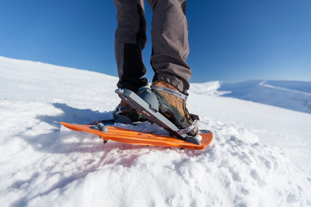 Snowshoeing in Carpathian mountains in wintertimeの写真素材