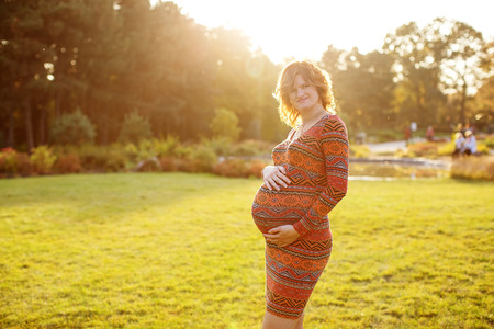 Pregnant female in autumnの写真素材