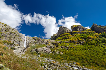 Waterfall under Ushba glacier in Mazery valleyin Georgiaの写真素材