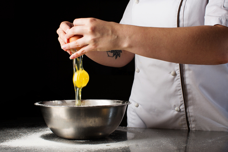Woman hands kneading dough.の写真素材