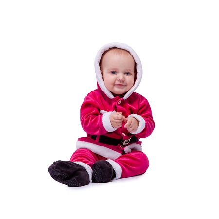 Cute little Santa posing against white backgroundの写真素材