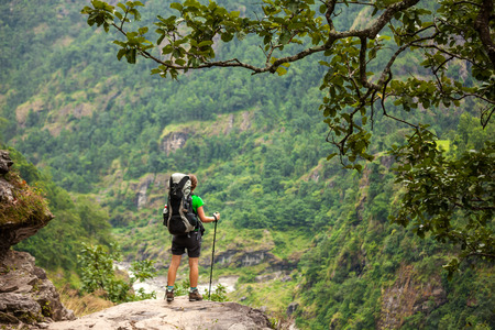 Hiker in highlands of Himalayas on Manaslu circuitの写真素材