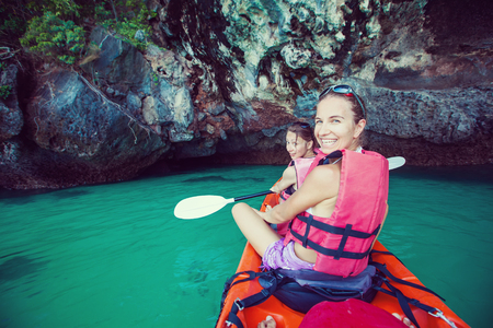 Women are kayaking in the sea caves at the Krabi shore, Thailandの写真素材