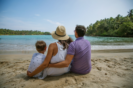 Family on vacation at the seashore of Indian oceanの写真素材