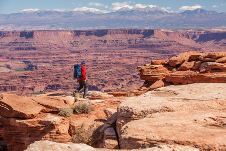 Hiker in Canyonlands National park in Utah, USAの写真素材