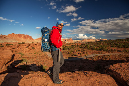Hiker in Capitol reef National park in Utah, USA