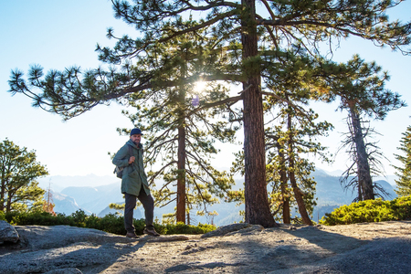 Hiker visit Yosemite national park in Californiaの写真素材