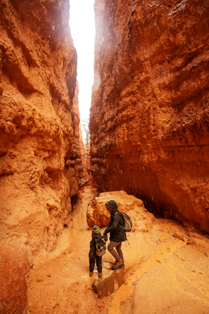 Mother with son are hiking in Bryce canyon National Park, Utah, USAの写真素材